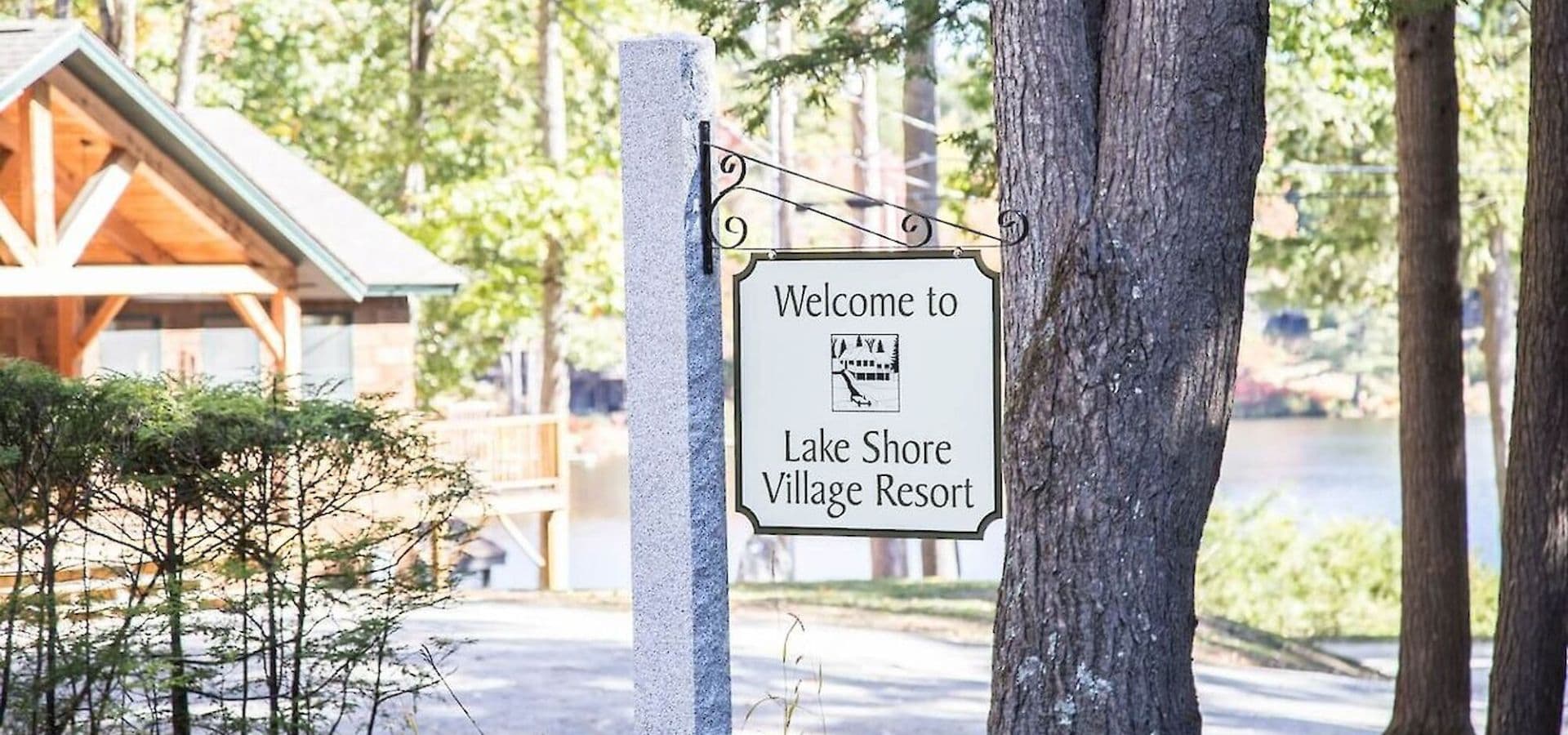 Sign welcoming visitors to Lake Shore Village Resort.